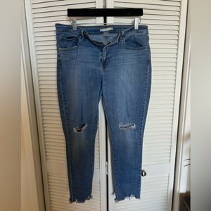 Size 32 Distressed jeans.